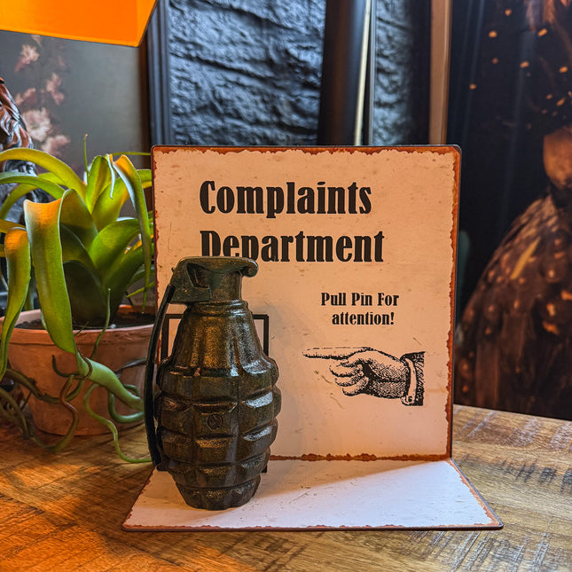 Antiqued Metal Complaints Department Table Sign with Grenade