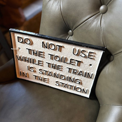 Cast Iron Toilet Warning Sign