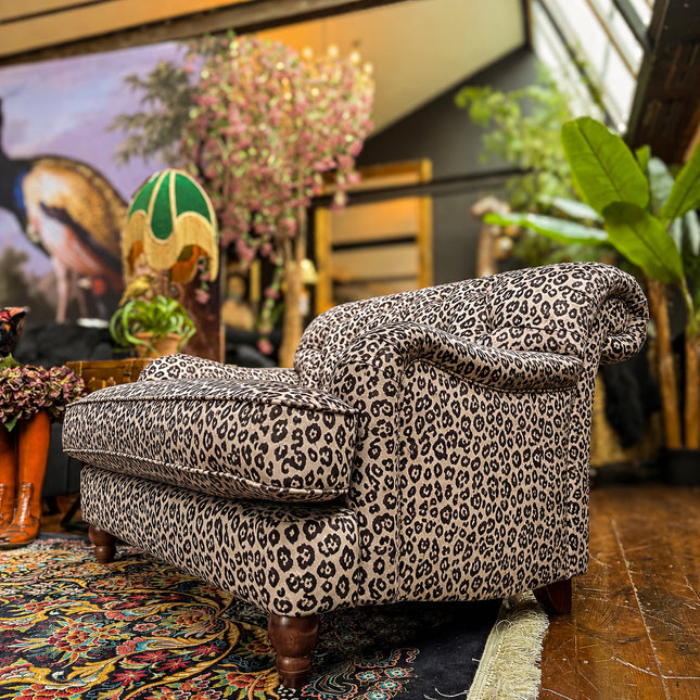 Eaton Chesterfield Loveseat Snuggler in Animal Velvet