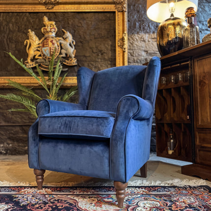 Monty High Back Chesterfield Wingback Armchair in Opulence Sapphire Velvet