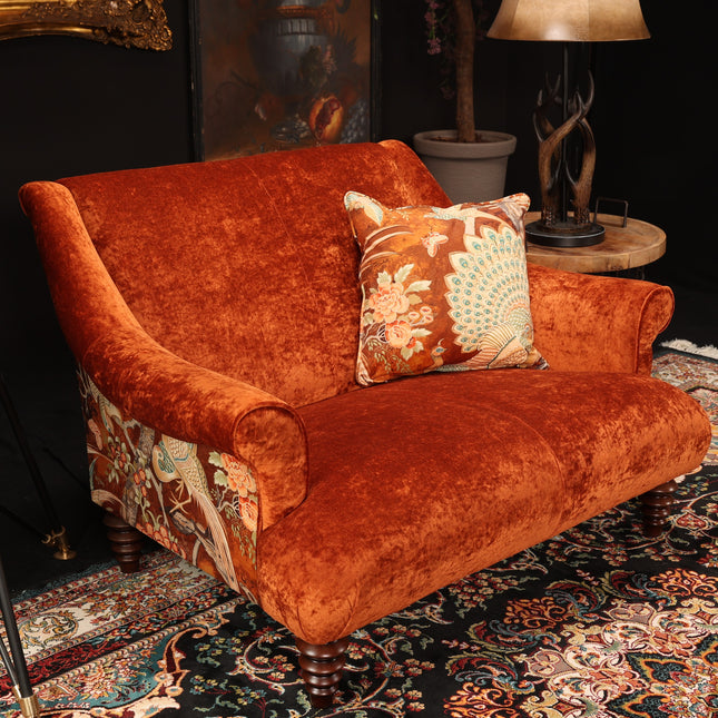 Osborn Snuggler Sofa in Amber & Orange Safari Peacock Velvet