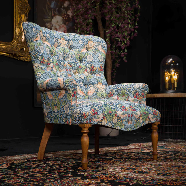 Selfridges Buttoned Wing Chair in Morris Blue Velvet