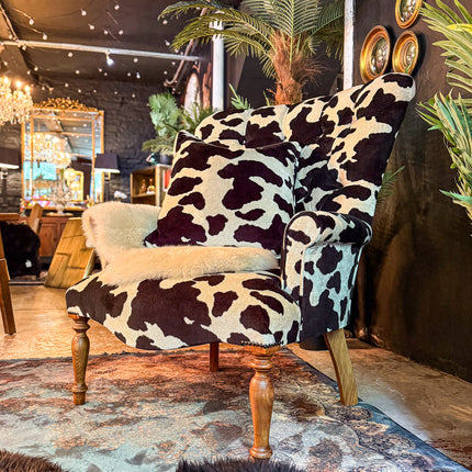 Selfridges Buttoned Wing Back Chair in Animal Velvet