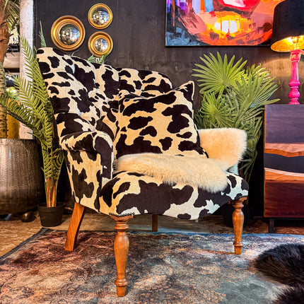 Selfridges Buttoned Wing Back Chair in Animal Velvet