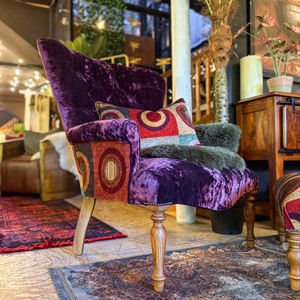 Selfridges Buttoned Wing Back Chair in Mulberry Dress Circle & Sunshine Amethyst
