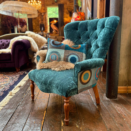 Selfridges Buttoned Wing Back Chair in Dress Circle Teal & Sunshine Turquoise