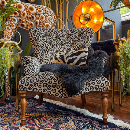 Selfridges Buttoned Wing Back Chair in Animal Velvet