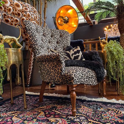 Selfridges Buttoned Wing Back Chair in Animal Velvet