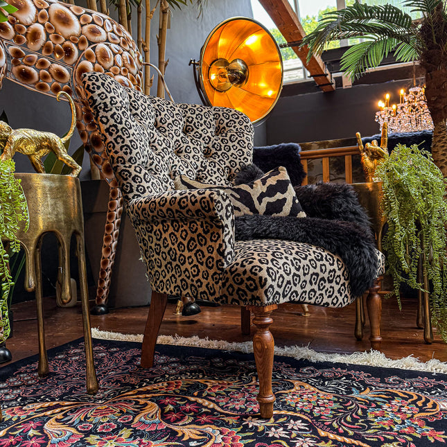 Selfridges Buttoned Wing Back Chair in Animal Velvet