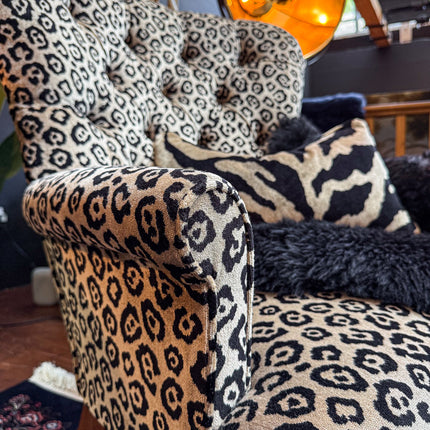 Selfridges Buttoned Wing Back Chair in Animal Velvet