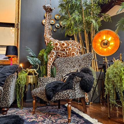 Selfridges Buttoned Wing Back Chair in Animal Velvet