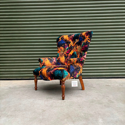 Selfridges Buttoned Wing Back Chair in Opal Flora Velvet